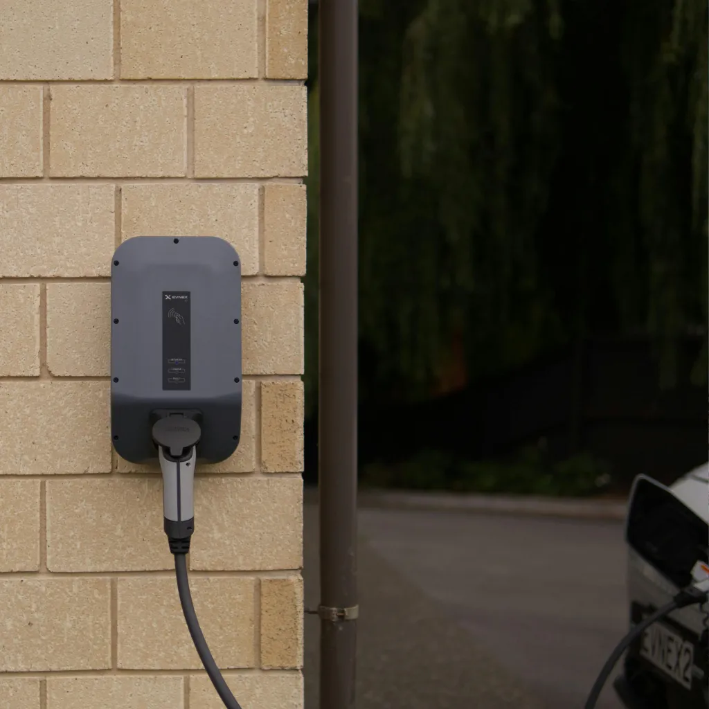 Wall-mounted EV charger installed by Home Comfort Enterprises